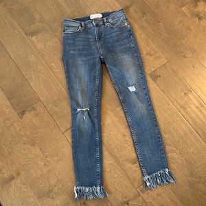 Free People skinny distressed destructed medium wash jean raw hem size 26